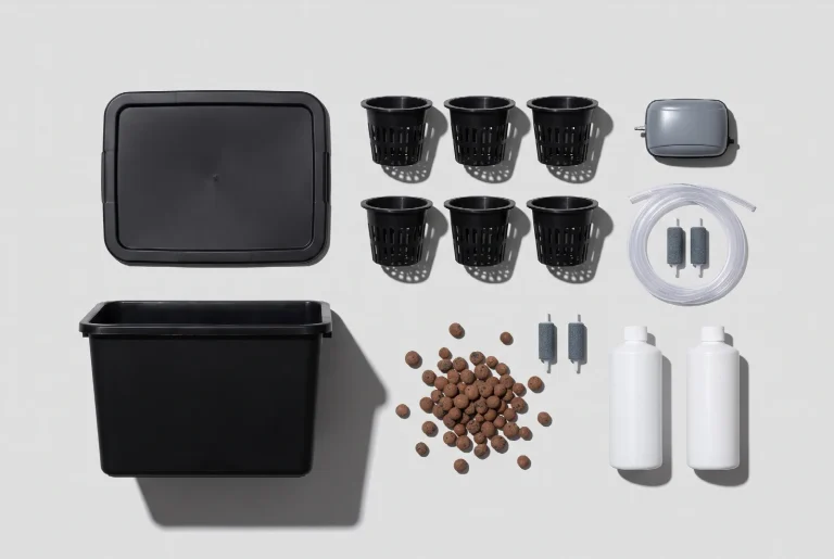 Flat lay of the parts for a six-plant hydroponic build: a black tote and lid, six net pots, an air pump, tubing, air stones, clay pebbles and two unlabelled nutrient bottles.